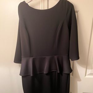 Black peplum cocktail dress
